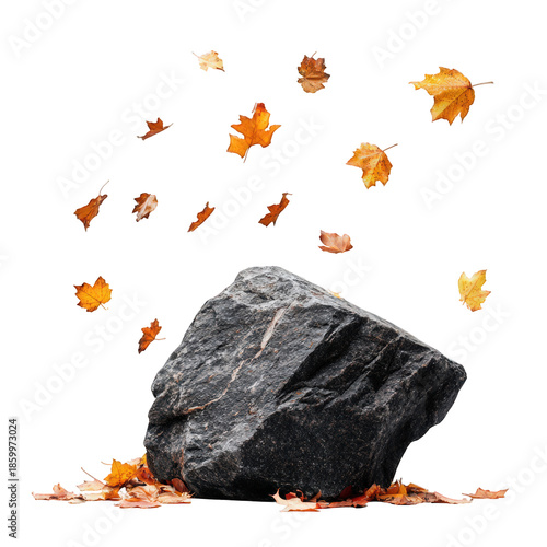Rock with falling autumn leaves over stone with fall foliage