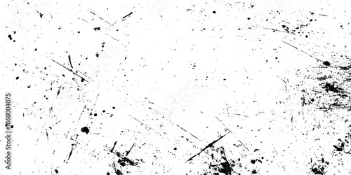 A stark distressed grunge texture featuring scattered dark markings and scratches on a predominantly white background