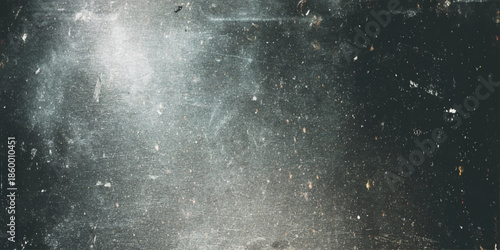 Abstract dark textured background with blurred light streaks and subtle particles resembling a cosmic or smoky effect