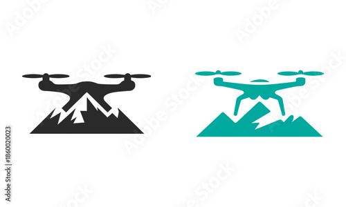 Black and teal drone flying over a mountain quadcopter landscape