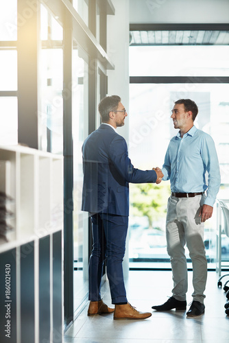 Fotografía Hello, business men and handshake in office for introduction, client representation or offer
