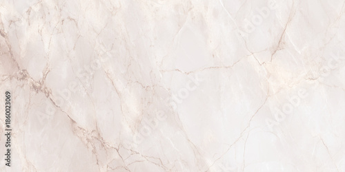 A close up view of a beautiful beige and white marble texture showcasing natural veining and subtle patterns