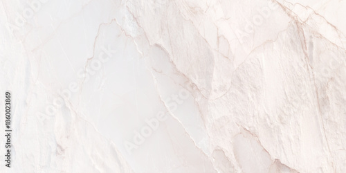 A close up view of a creamy white marble texture with subtle veining patterns and a polished surface