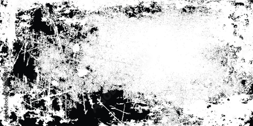 A distressed scratched and heavily textured black and white abstract background with a central light area