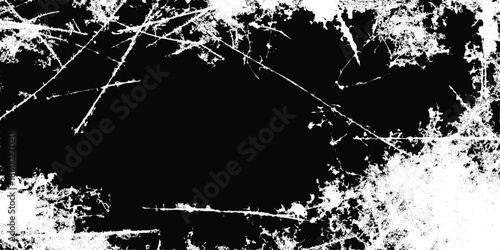 A stark black and white image featuring a chaotic network of intersecting lines and textured abstract patterns