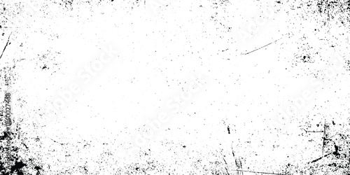 A distressed textured background featuring a predominantly white canvas with dark scattered imperfections and grimy edges