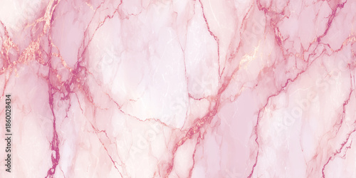 A beautiful close up view of a pink marble texture with delicate gold vein patterns throughout the surface