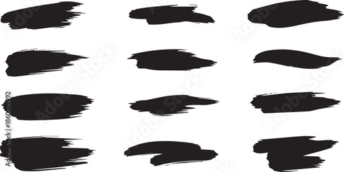 Collection of abstract dark cloud shapes isolated on a black background, graphic elements.