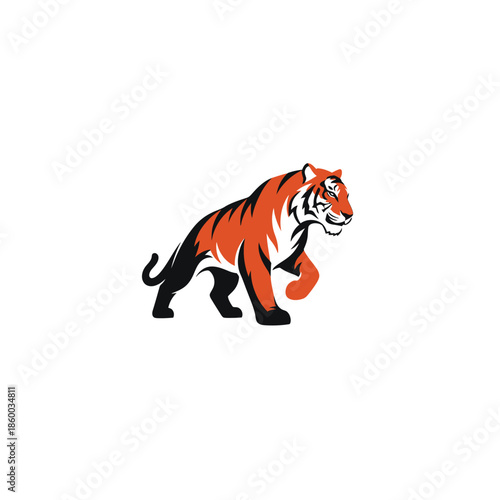 Majestic tiger prowling forward, showcasing vibrant orange and black stripes, ready to hunt.
