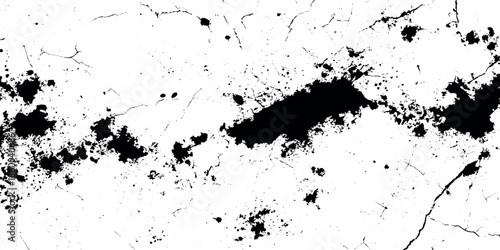 Abstract black and white texture displaying a cracked or distressed surface with irregular shapes and patterns