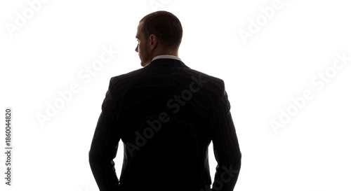 Man in black suit jacket from behind