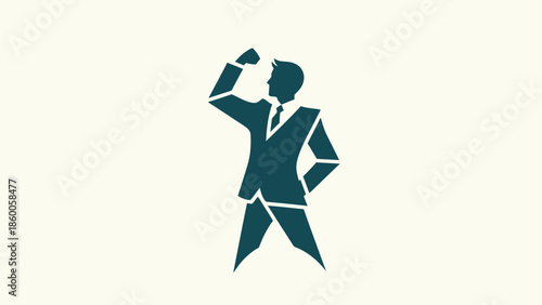 Successful businessman celebrating achievement with raised fist and confidence.