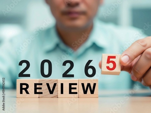 Business Review 2025 Turning Into 2026 on Wooden Blocks for Strategic Planning