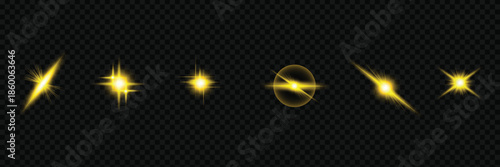 Collection of yellow glowing light effects including lens flares and star bursts on transparent background