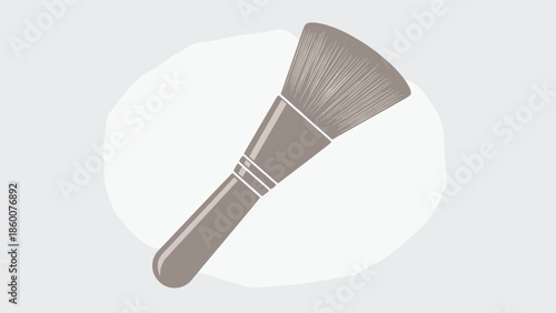 A simple yet elegant silhouette of a large, fluffy powder brush for applying loose or pressed makeup on the face.