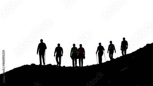 Group of hikers silhouetted against a bright sky on a mountain ridge.