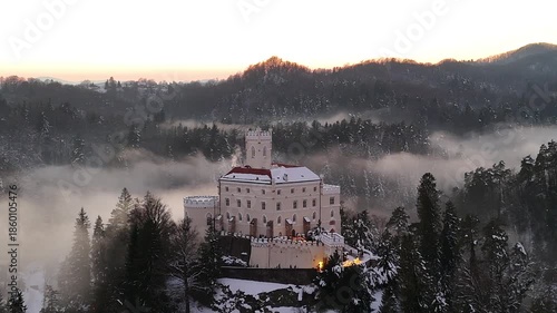 Aerial Golden Hour Winter Video of Trakošćan Castle, Snowy Castle at Sunset in Croatia