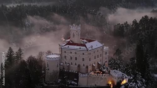 Aerial Golden Hour Winter Video of Trakošćan Castle, Snowy Castle at Sunset in Croatia