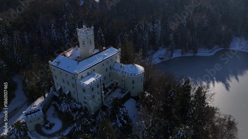 Aerial Golden Hour Winter Video of Trakošćan Castle, Snowy Castle at Sunset in Croatia