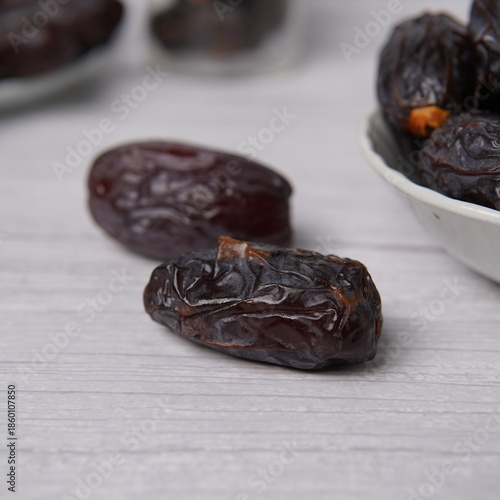 Canvas Print Premium Kalmi dates featuring a firm yet chewy texture, deep brown color, and naturally sweet flavor