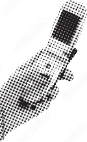 Hand holding an opened silver clamshell cell phone featuring a small external camera lens and screen display