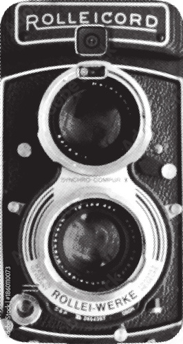 Vintage Rollei Cord twin lens reflex camera featuring dual lenses and classic German engineering design