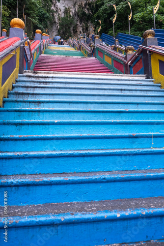 Steps of Batu Caves, a famous shrine and limestone hill complex, known for its stunning cave temples and the giant stature of Lord Murugan near Kuala Lumpur, Malaysia