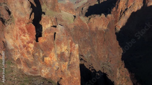 Looking Down On Rocks with Valley and Sky Reveal