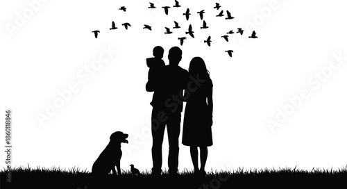 Silhouette of a happy family with a small child standing in a field with their dog and flying birds.