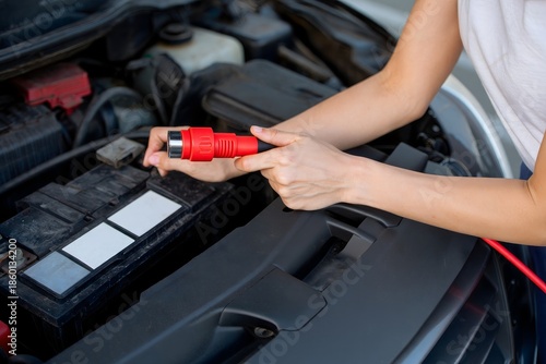 Automotive Diagnostic Tool Connection in Car Engine Bay