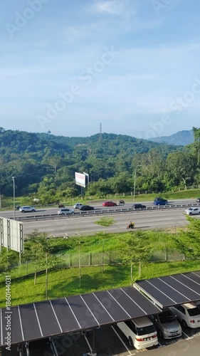 Malaysia, Bangi—January 16, 2023: Cars on the North-South highway during peak hours. Vertical.