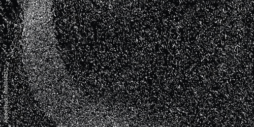 Close-up macro shot of black sesame seeds showing their textured surface and granular detail.