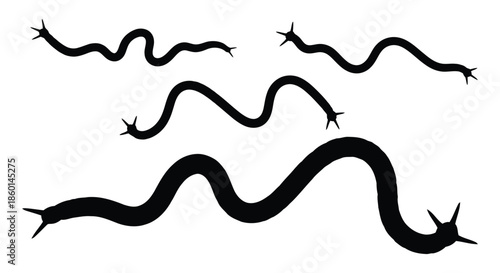 Collection of black silhouettes of worms or snakes on a white background