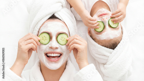 Mother and daughter enjoying spa facial mask treatment