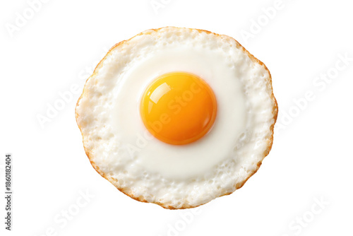 single sunny side up fried egg viewed from above, featuring a bright golden yolk centered in soft white egg whites with gently crisp edges. Minimalist food composition isolated on a clean white 