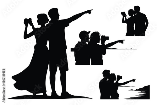 Silhouettes of people taking and pointing at a couple on a beach