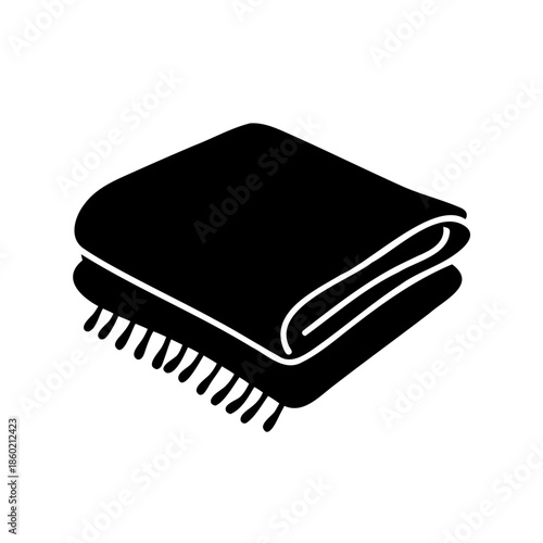 Folded blanket with tassels, a soft and cozy textile for comfort