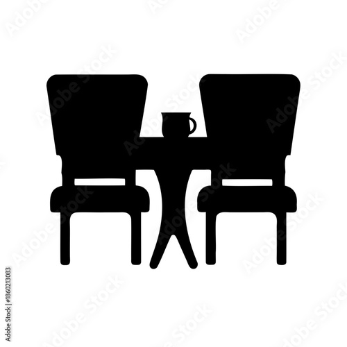 Two comfortable chairs and a cup resting on a table silhouette