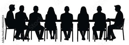 silhouette of people sitting at a table