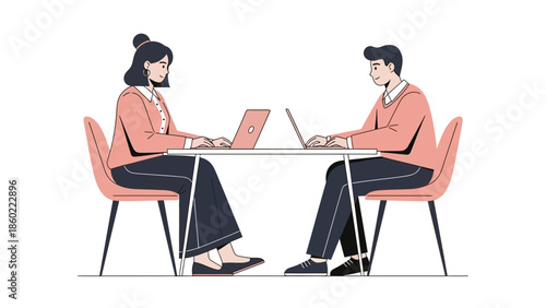 Modern office meeting between a woman and a man working on laptops at a table