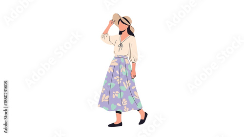 Stylish Woman Wearing a Long Floral Skirt and Wide-Brimmed Hat Walking Outdoors