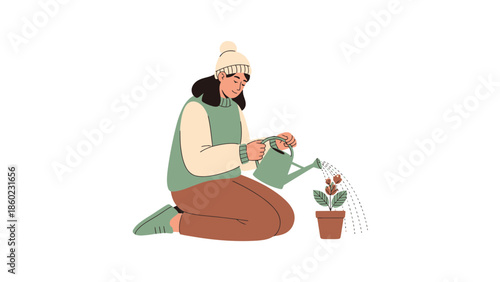Young woman sitting on the ground watering a potted plant with care and patience in a minimalistic