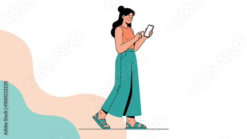Young woman walking while using smartphone in casual attire and high heels