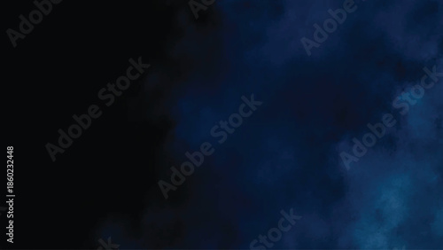 Abstract blue smoke and dark background create a dramatic, atmospheric image