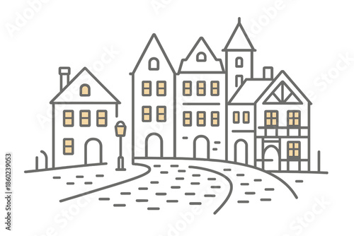 Misty medieval town street at night with glowing windows