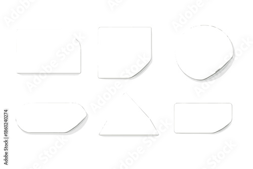 Blank White Stickers with Peeling Corners on Gray Background