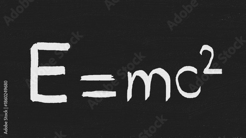 Einstein mass energy equivalence formula E=mc2 on blackboard. Perfect for physics education and science concepts.