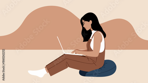 Young woman comfortably working remotely on her laptop from a relaxed home environment, embodying a modern flexible lifestyle and independent productivity