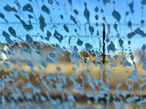 water drops on the window. Car window washing