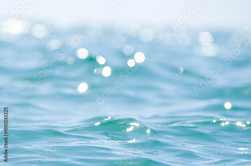 Lights on sea background. Waves.